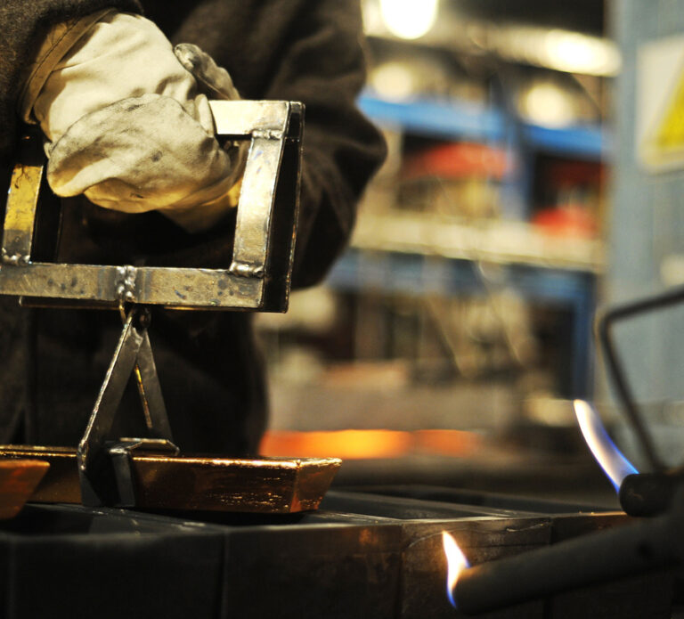 Gold price fights back towards $1,200